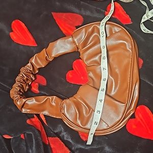 Cute chocolate brown bag with scrunched handle.